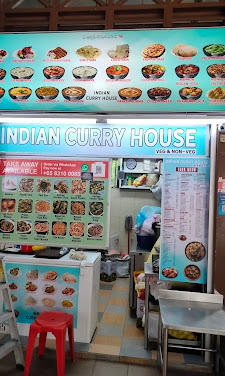 Indian Curry House Newton Circus food stall front with menu boards